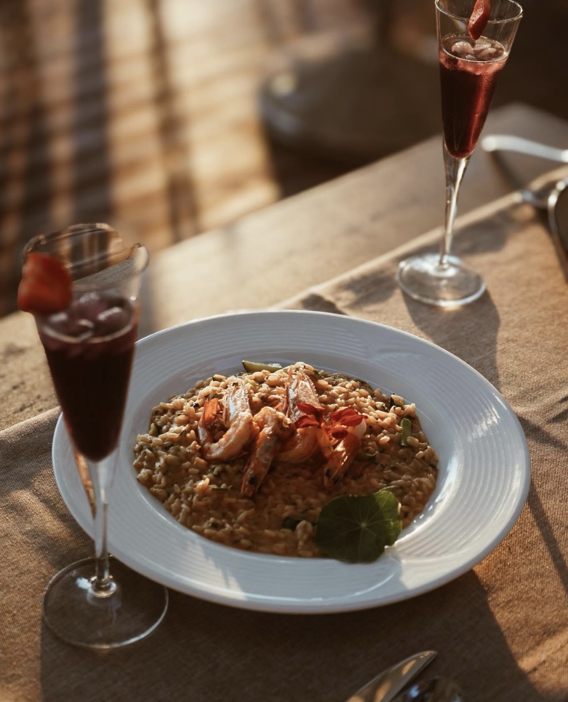 Prawn risotto with a glass of wine